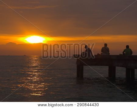 Port Dickson, Malaysia September 14, 2018 :  Jetty And Unidentified People Closeup During Sunset At 
