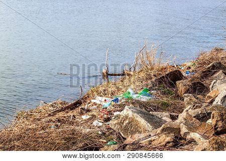 Plastic Waste On The Lake Shore In The Czech Republic. Environmental Pollution. Recycling Of Plastic