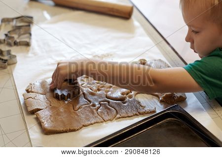 Cute Caucasian Baby Boy Helps In Kitchen, Making Homemade Coockies. Casual Lifestyle In Home Interio