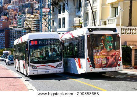 Monte-carlo, Monaco - March 12, 2019: White Urban Buses Van Hool New A330 Hyb In The City Street.