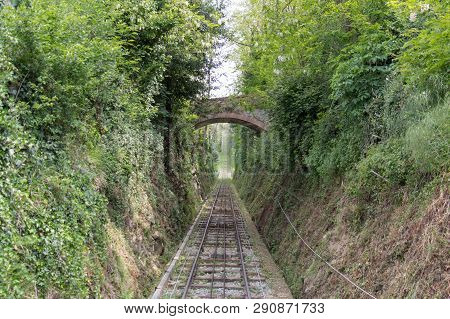 The View Of Railroad Through Green Trees Between Montecatini Terme And Montecatini Alto, Tuscany, It