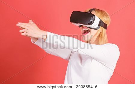 Woman Using Vr Device. The Woman With Glasses Of Virtual Reality. Happy Young Woman Wearing Virtual 