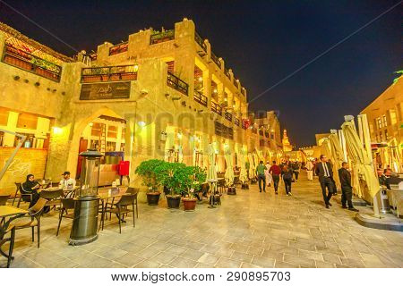 Doha, Qatar - February 17, 2019: Street View In Souq Waqif Old Traditional Market With Cafes And Res