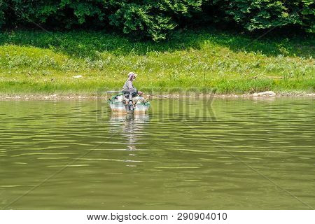 Dnister River Canyon, Ukraine - July, 2017: Fishermen On A Boat Ride Along The Dniester River.