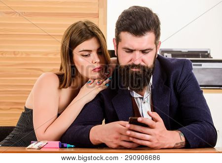 Flirting With Coworker. Woman Flirting With Coworker. Woman Attractive Lady Working With Man Colleag