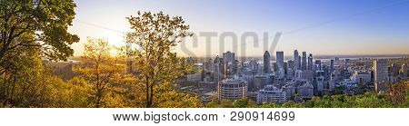Amazing View Of Montreal City At Sunrise With Colorful Blue Architecture, Green And Yellow Landscape
