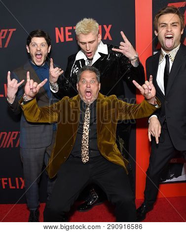 LOS ANGELES - MAR 18:  Jeff Tremaine, Iwan Rheon, Machine Gun Kelly and Douglas Booth arrives for the Netflix 'The Dirt' Premiere on March 18, 2019 in Hollywood, CA                