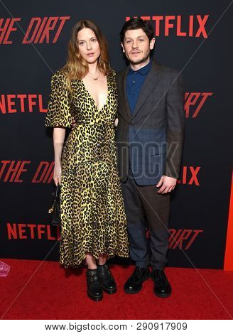 LOS ANGELES - MAR 18:  Zoe Grisedale and Iwan Rheon arrives for the Netflix 'The Dirt' Premiere on March 18, 2019 in Hollywood, CA                