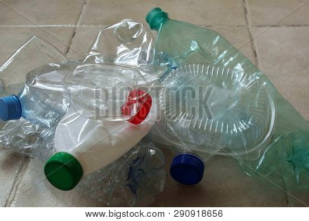 View Of A Bunch Of Empty Multicolored Plastic Bottles Prepared For Recycling. Crumpled Clean Plastic