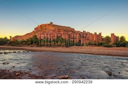 Ait Benhaddou With Asif Ounila River In Morocco At Sunset. This City Was Built Along The Caravan Rou