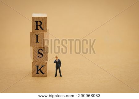 Miniature People Businessmen Standing With Wood Word Risk Using As Background Business Concept And R