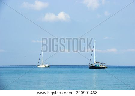 White And Black Sailboat Of Tourist At The Background The Blue Sky On The Ao Thai Sea Area Around Ha