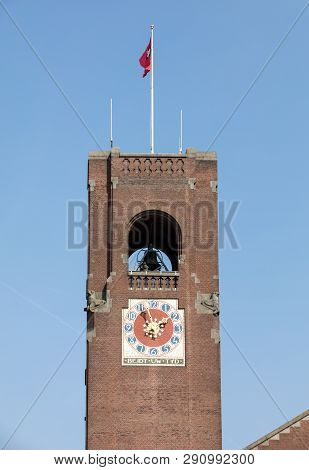 Clock Tower Of The Beurs Van Berlage - A Historical Building On The Damrak, In The Centre Of Amsterd