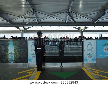 Jakarta, Indonesia - March 23, 2019: A Security Guard Stand On The Platform At Lebak Bulus Mrt Stati