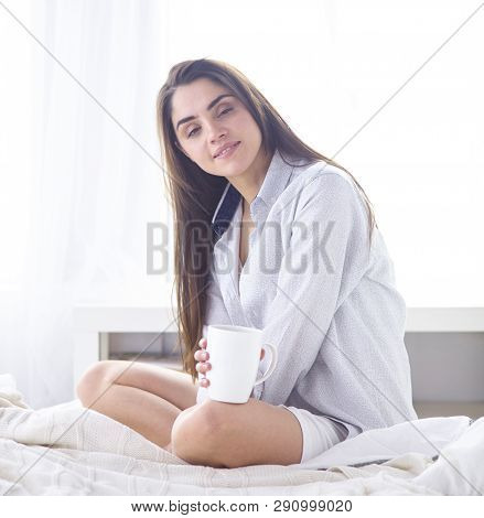 Young Beautiful Happy Brunette Woman In Black Silk Dressing Gow