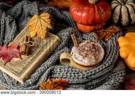 Autumn Concept, Still Life Of Pumpkin Latte With Whipped Milk Cream And Cinamon. Colorful Pumpkins A