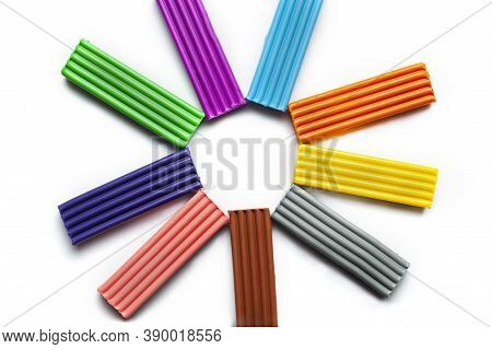 Multi-colored Plasticine On A White Background Is Located In A Circle