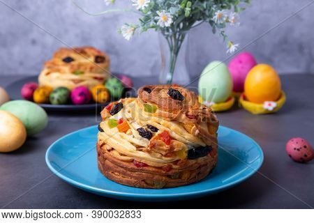 Craffin (cruffin) With Raisins, Nuts And Candied Fruits. Easter Bread Kulich And Painted Eggs. Easte