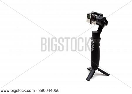 London, United Kingdom, 21st September 2020:- An Isteady Gimbal With A Gopro Hero4 Camera Isolated O