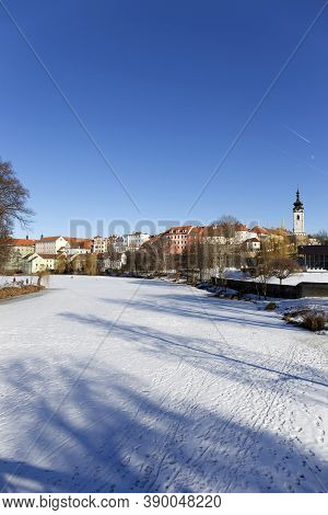 Colorful Royal Snowy Medieval Town Pisek Above The Frozen River Otava, Czech Republic