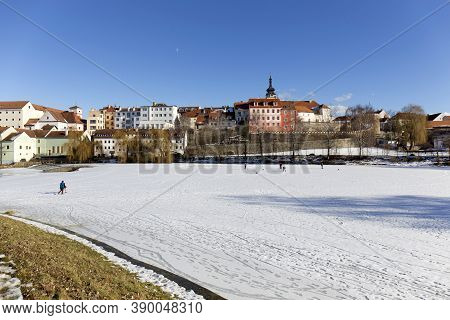 Colorful Royal Snowy Medieval Town Pisek Above The Frozen River Otava, Czech Republic