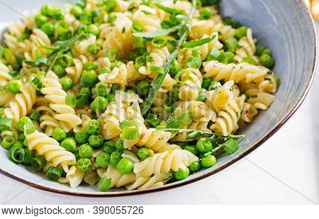Vegan Salad. Fusilli Pasta With Green Peas And Onions. Italian Food.