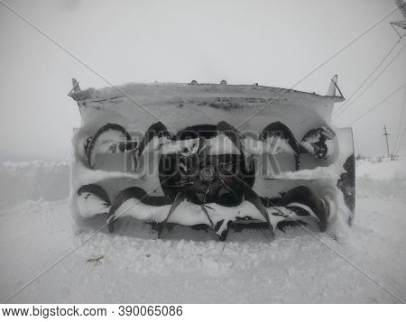Rotary Mechanism Of A Snowplow On Snow Removal After A Snowfall