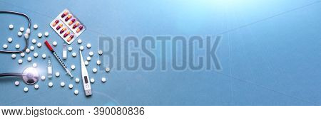 Pills, Ampoule, Syringes, Capsules, Stethoscope On The Blue Doctor S Table. Copy Space. Place For Te