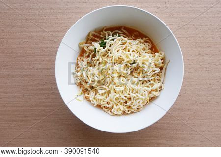 Close Up Dry Tomyum Noodle On Wooden Table