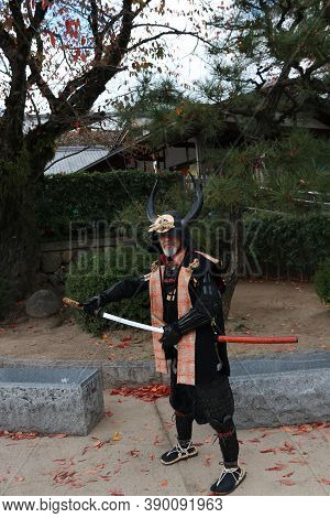Himeji, Hyogo, Kansai, Japan November 19, 2017: Man In Samurai Dress, Tourist Can Be Take A Photo To