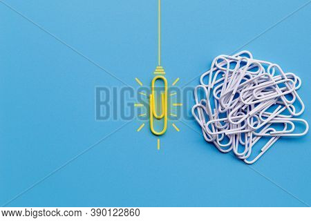 Great Ideas Concept With Paperclip,thinking,creativity,light Bulb On Blue Background,new Ideas Conce