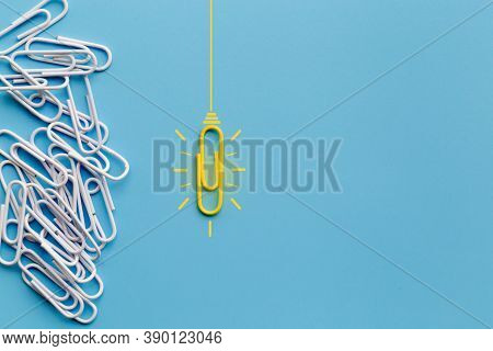 Great Ideas Concept With Paperclip,thinking,creativity,light Bulb On Blue Background,new Ideas Conce