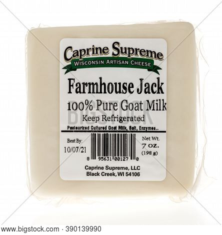 Winneconne, Wi - 16 October 2020:  A Package Of Caprine Supreme Wisconsin Artisan Goat Cheese On An 