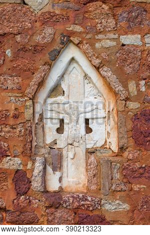 Ancient Embedded Cross With Crucifixion Close-up. Fragment Of The Design Of The Church Of The Transf