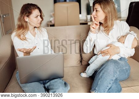 Young Mother Working From Home, Talking With Colleague, Caring Grandmother Babysit With Little Grand