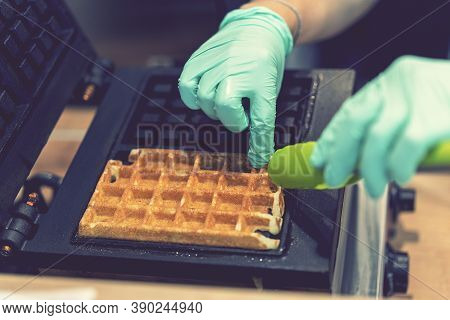 Waffle Iron In The Kitchen. Preparing Homemade Waffles, Pouring A Dough. Preparing Of Homemade Waffl
