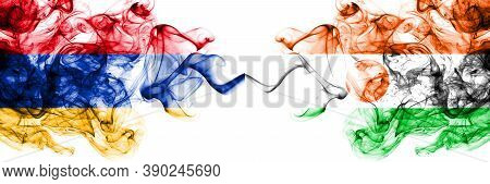 Armenia Vs Niger, Nigerien Smoky Mystic Flags Placed Side By Side. Thick Colored Silky Abstract Smok