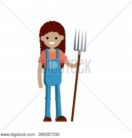 Woman Farmer In Overalls With Fork In Hands. Rural Type Of Work. Production Of Natural Food In The V