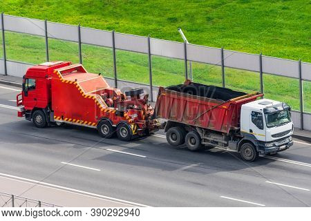 Powerful Big Rig Semi Evacuation Truck Tractor Tows With Attached Broken Evacuated Truck With Body D