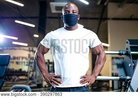 Spain Man In White Cotton T-thirt Wearing Mask While Working Out In Gym