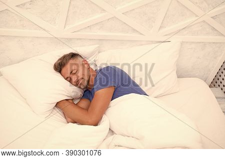 Man On The Bed. Tired Man Falling Sleep In Bed. Napping Man Concept. Bearded Male Sleep On Bed. Try 