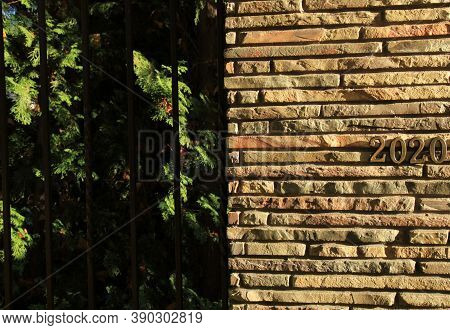 Autumn Or Fall Of 2020. Inscription In Golden Numbers 2020 On The Stone (docorative Bricks) Wall, Sy