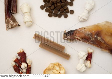Variety Of Dog Treats. Dod Delicacy Food On White Background.