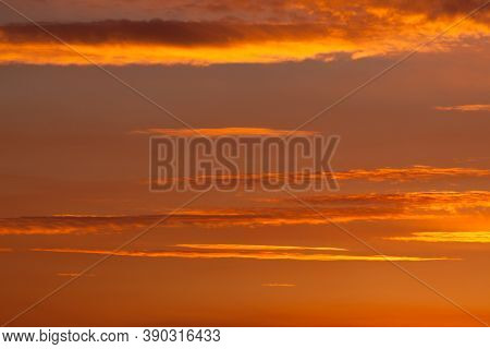 Thick Smoke From A Nearby Forest Fire Turn The Sunset Sky Into A Glowing Orange Background Over The 