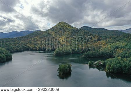 Aerial Image Of Funnel Top Mountain And Lake Santeetlah, North Carolina In Autumn Color.