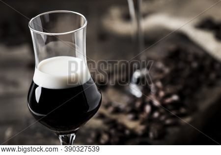 Two-layer Cocktail With Coffee And Cream Liqueur, Vintage Wood Background, Selective Focus