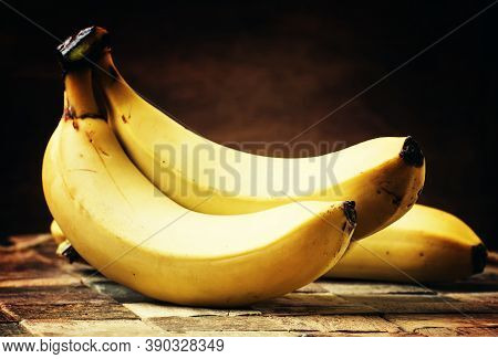 Ripe Bananas On A Vintage Wooden Background, Rustic Style, Selective Focus