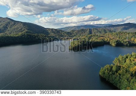 Aerial View Of Lake Santeetlah, North Carolina And Surrounding National Forests In Autumn Color.