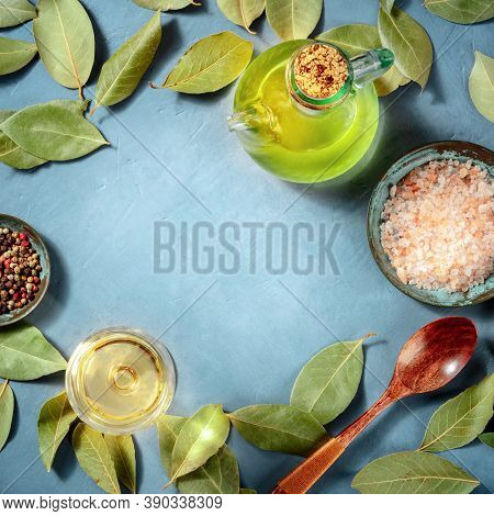Square Cooking Background, A Flat Lay With Bay Leaves, White Wine, Salt, Pepper, And Olive Oil, With
