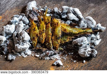 Indian Carplet Fish Or Mourala Fish In Charcoal With Selective Focus